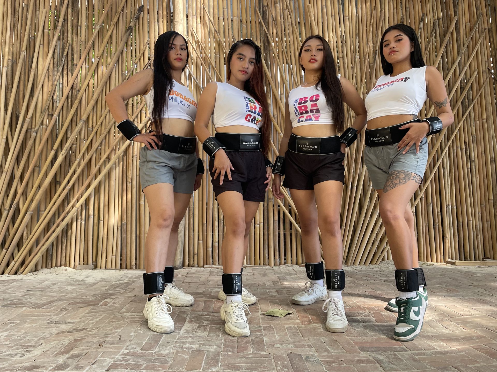 Four women modeling EleBands fitness collections