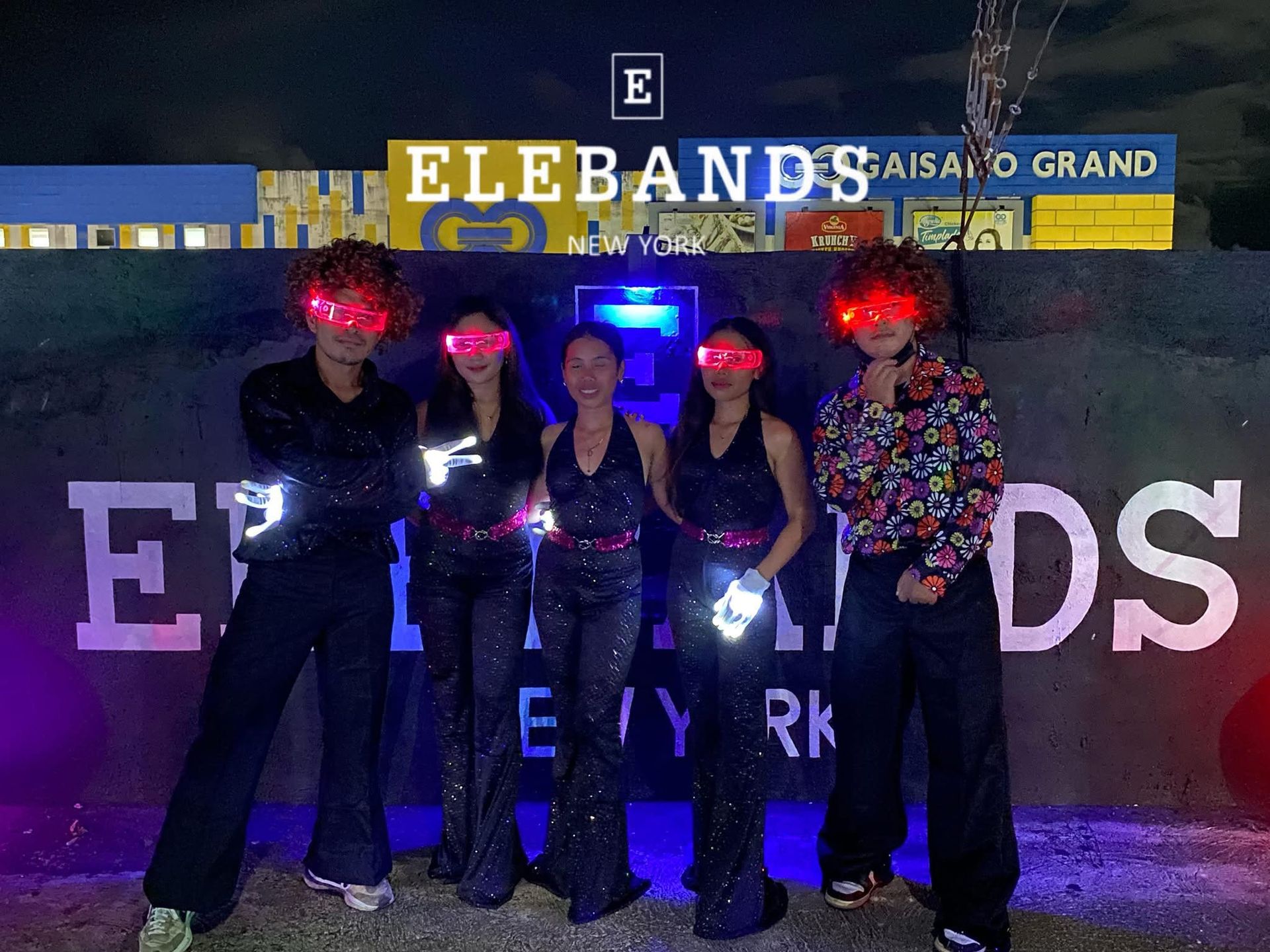 EleBands cardio group wearing illuminated fitness gear at a night event